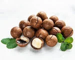 heap of shelled Macadamia Nut in white background