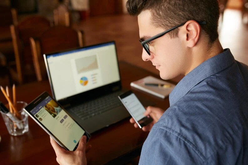 image of a platform worker checking earnings across multiple apps